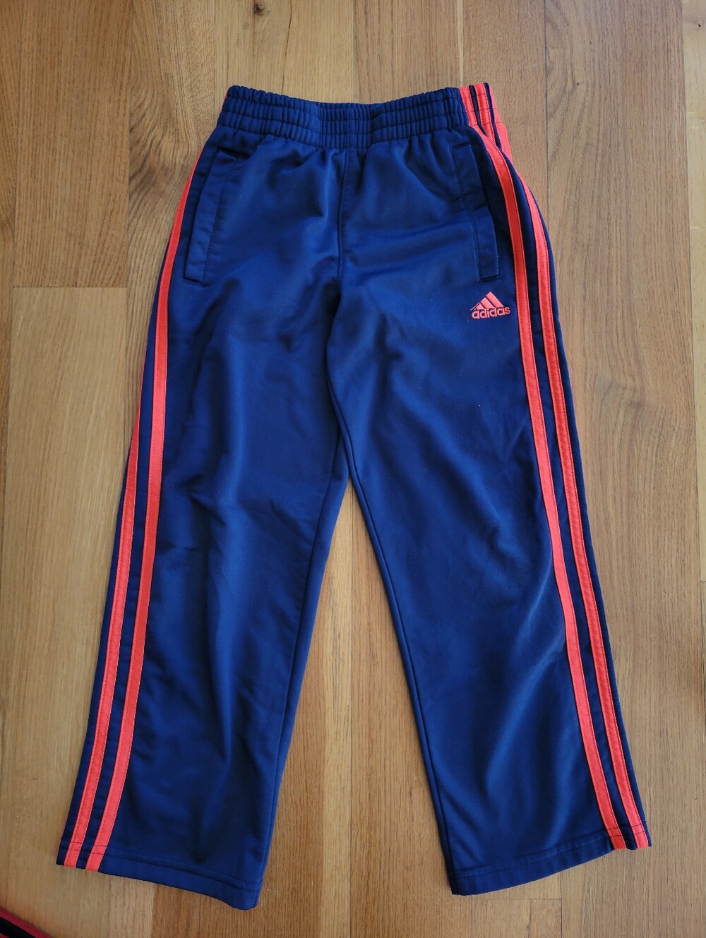 Boys size 7 Adidas Boys Track Pants Blue with Orange Stripes